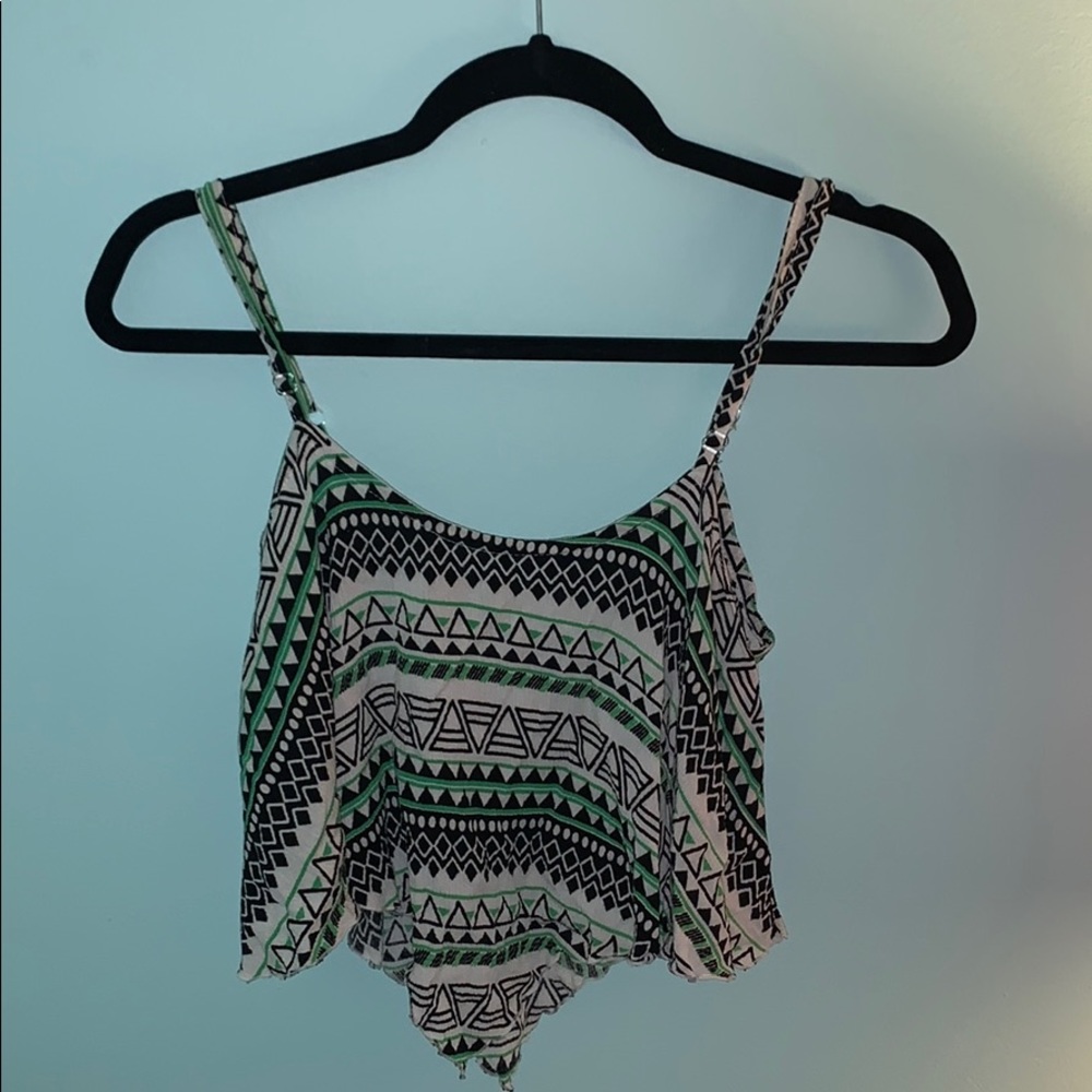 Green, white and black patterned tank top.